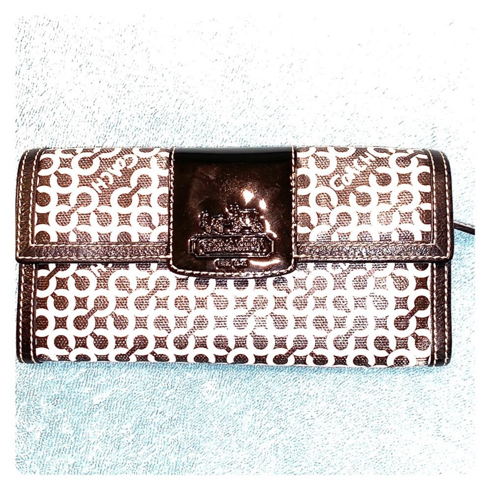 Coach black and white long wallet.